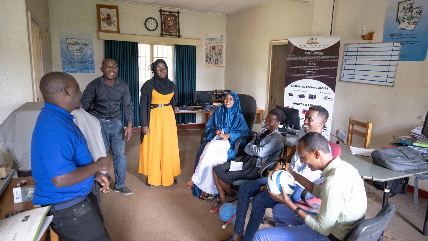 Photo of the UDHAN team interacts with representatives from a local civil society group.