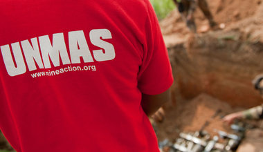 A member of the UN Mine Action Service (UNMAS) works to ensure the safe disposal of landmines and explosive remnants of war